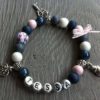Kinder armband Tessy met naam blauw wit roze