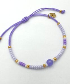 Verstelbare Ibiza armband in lavendel met jade kraal en rvs bloem bedel.