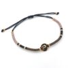 Ibiza armband met initiaal in zwart met champagne